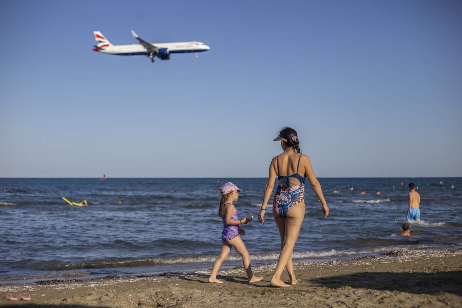 July 6. Woman And Child Seen On Larnaca Mackenzie Beach. Mattpress George Christophorou