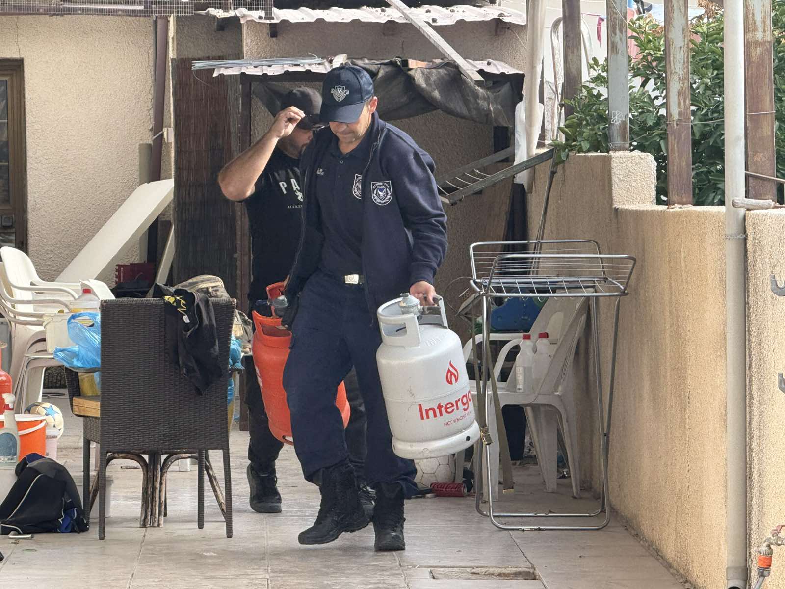 Officers Remove Gas Tanks After Womans Threatens Suicide Over House Foreclosure Limassol. Ioanna Mantzipa. December 3.