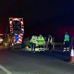 Worker was standing behind warning sign when car struck it, killing him, investigators find