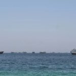 Iran claims it turned back US warship from Strait of Hormuz; Washington denies missile strike