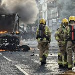 Belfast erupts in anti-immigrant violence as rioters torch homes after knife attack