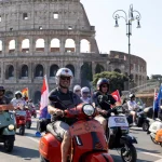 Vespa riders take to roads in Rome to mark 80th birthday