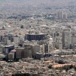 Blasts rock Damascus during Macron visit